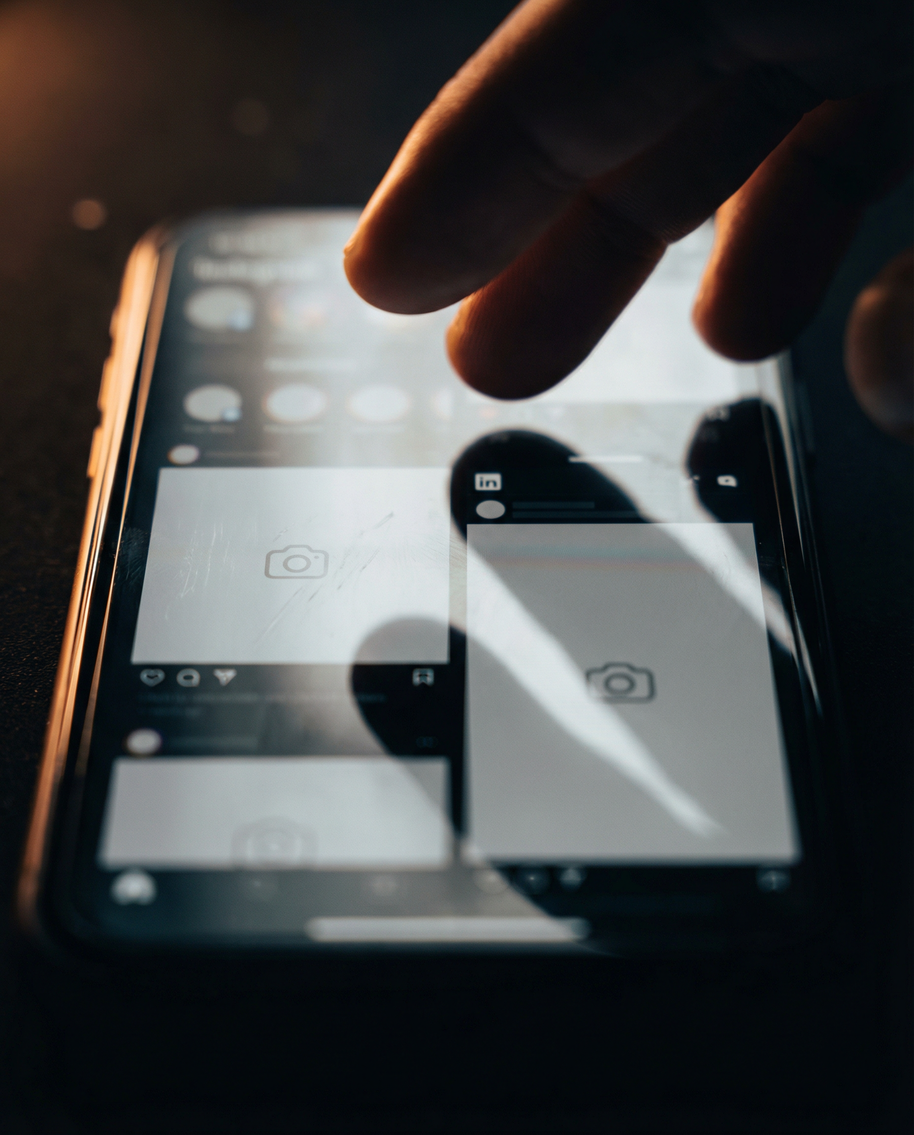Photorealistic editorial photograph: extreme close-up macro shot of smartphone screen displaying multiple social media apps simultaneously, Instagram and LinkedIn interfaces visible side by side showi